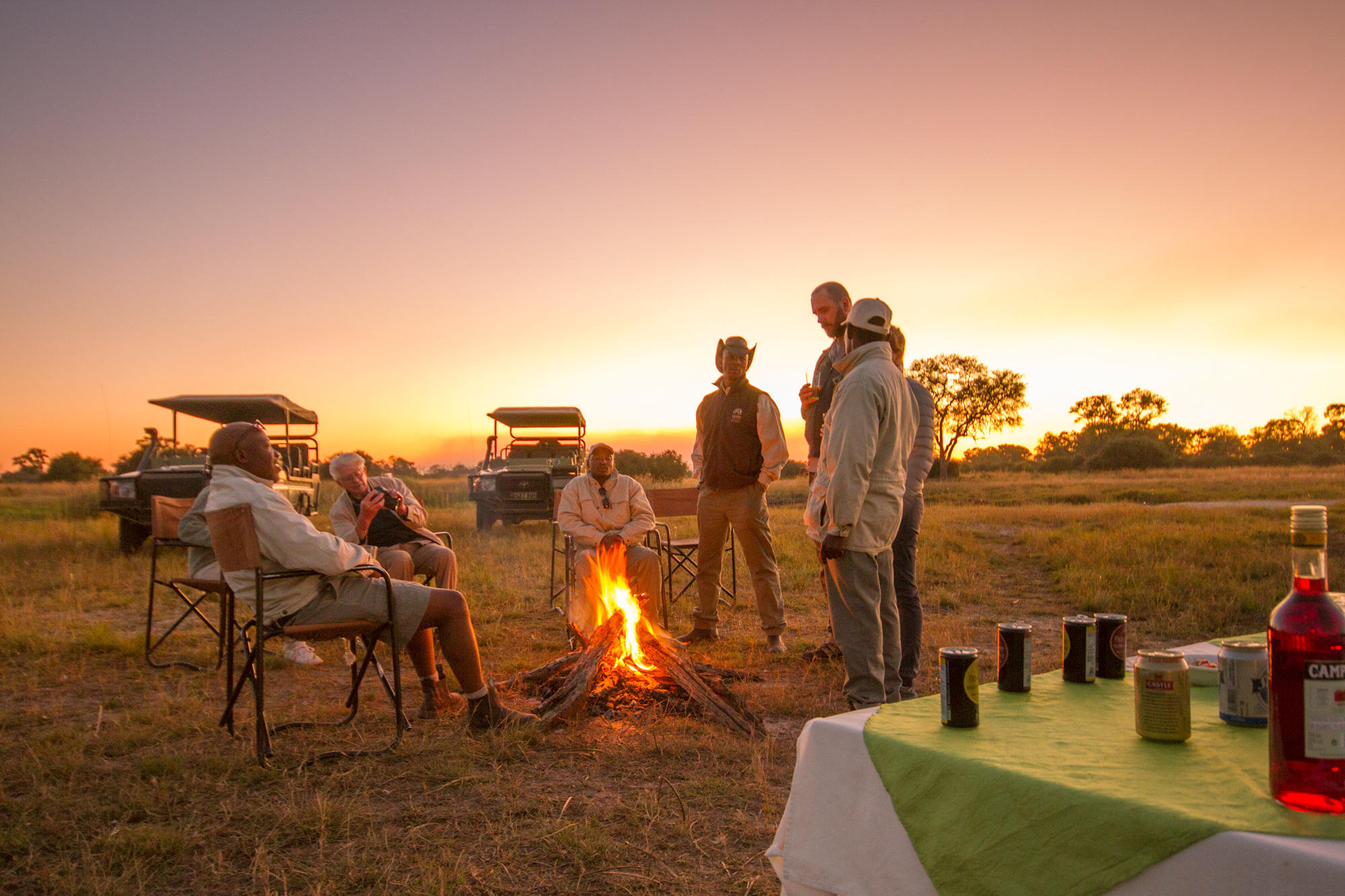Sundowners round the firepit at Lebala Camp
