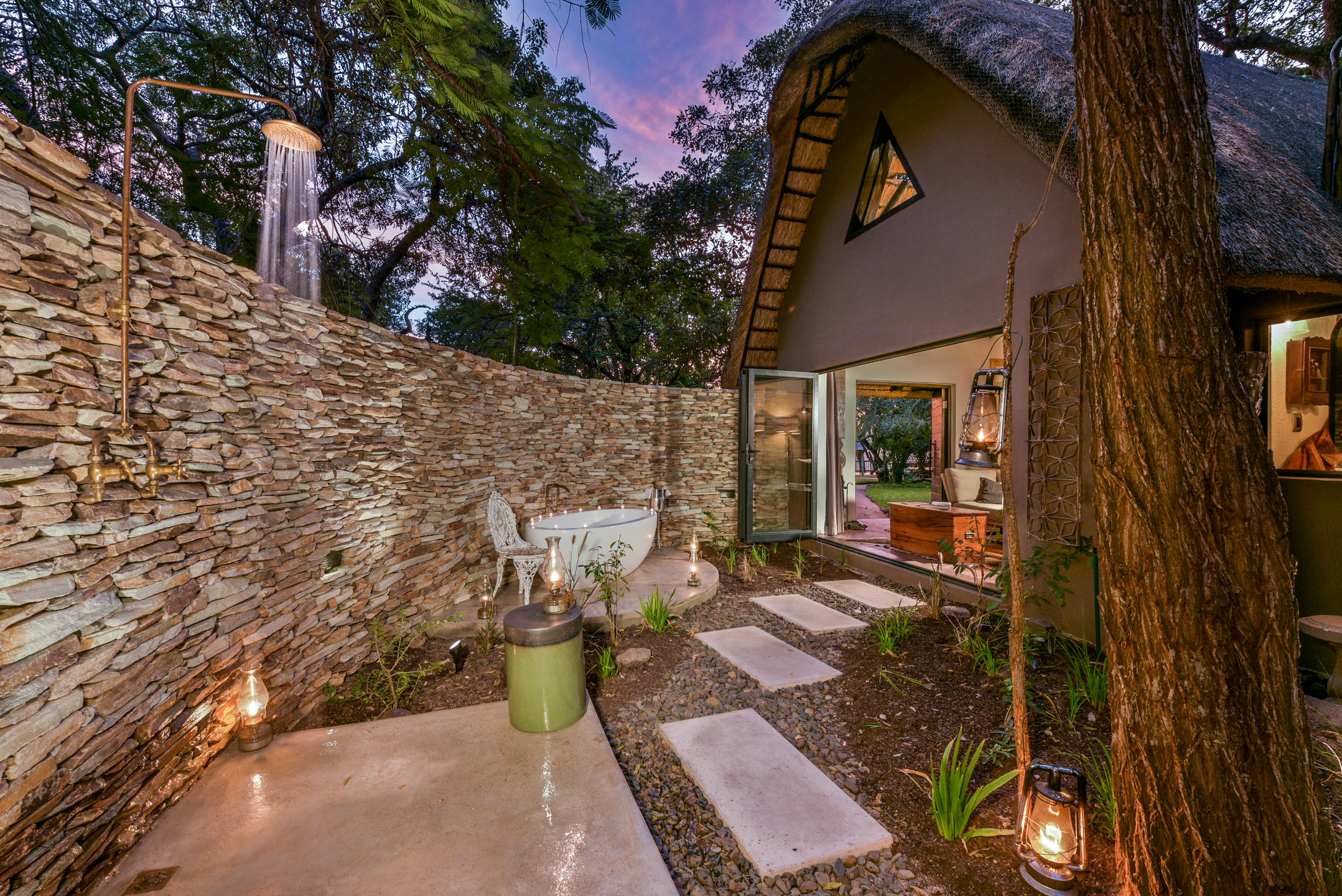 Private outdoor bath and shower at Sabi Sabi Selati Camp