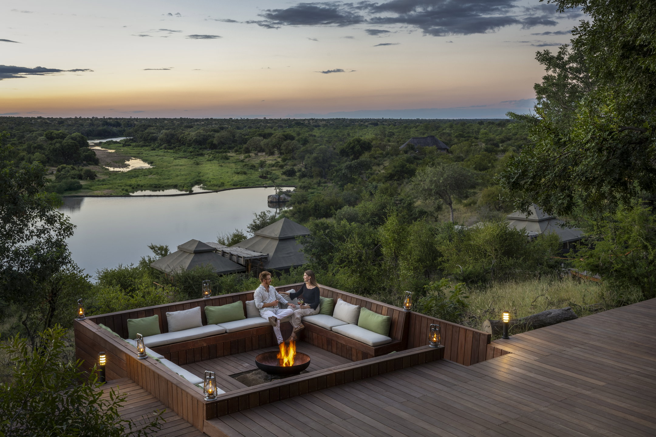 Sundowners by the fire at Simbavati Hilltop Lodge