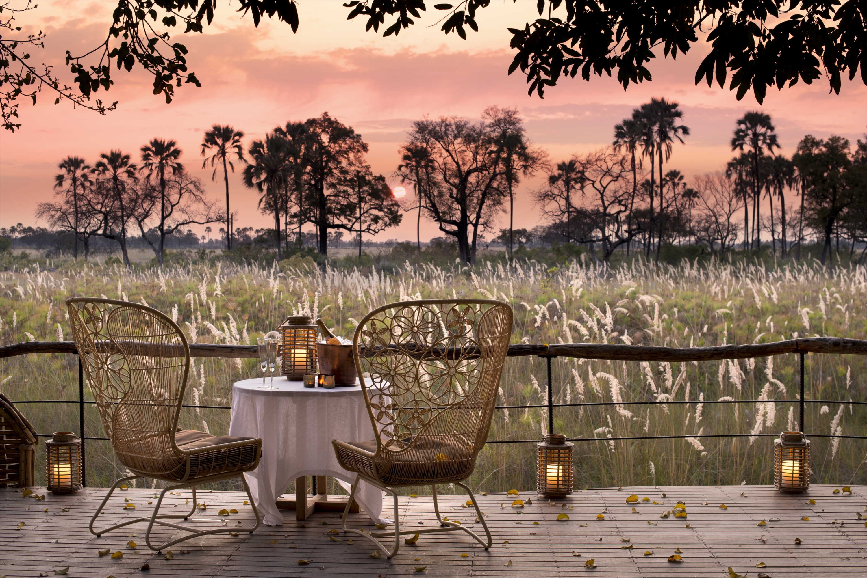 drinks on the deck at sandibe okavango safari lodge