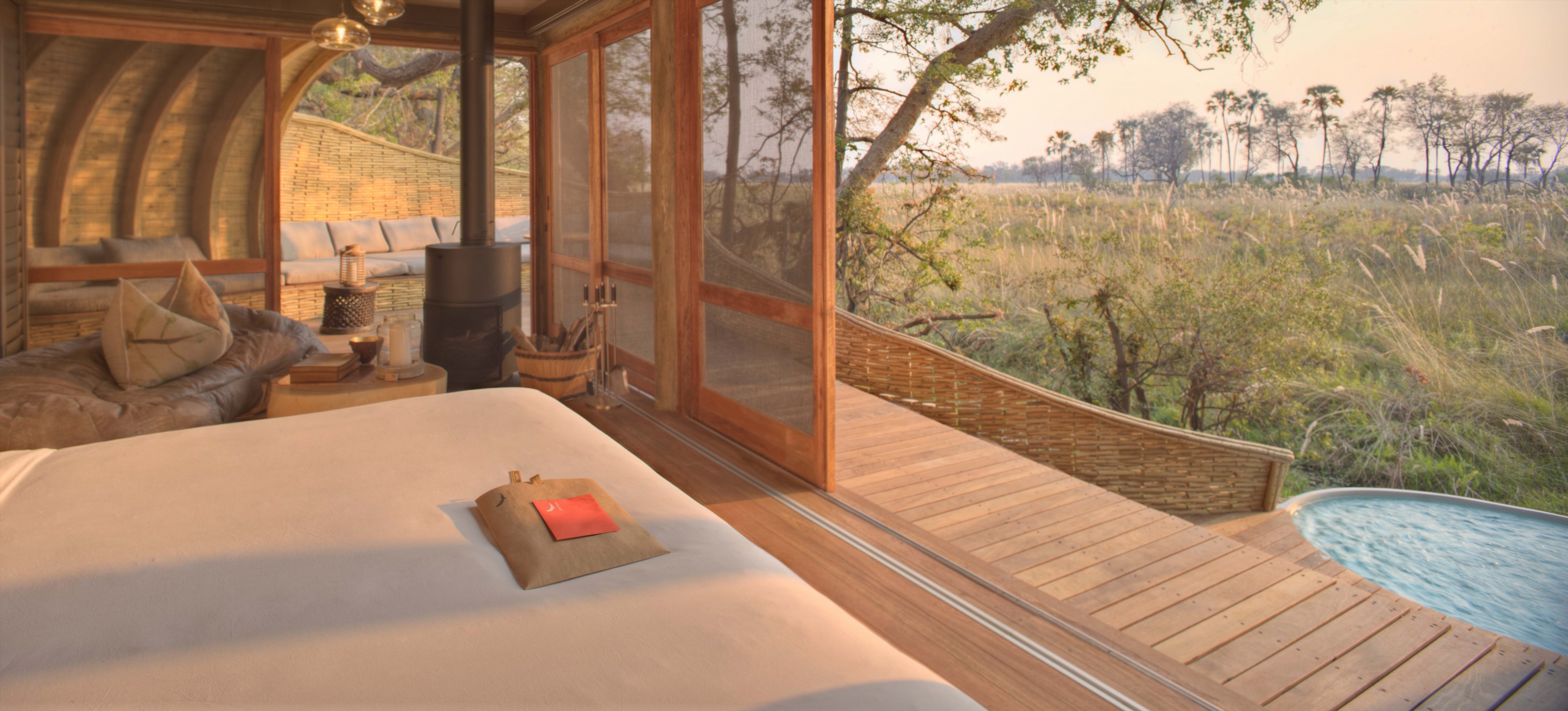 Suite at sandibe with wood burning stove and views